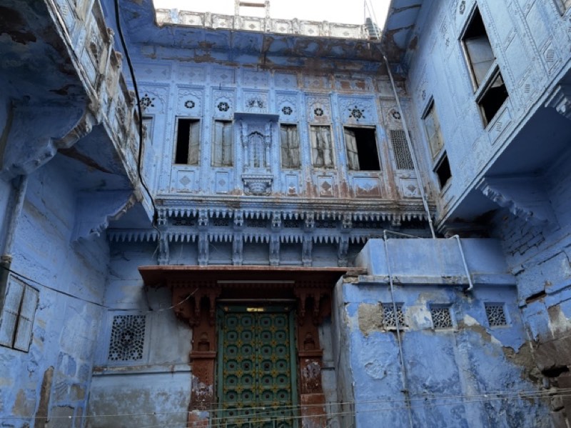 A carved haveli courtyard washed in indigo
