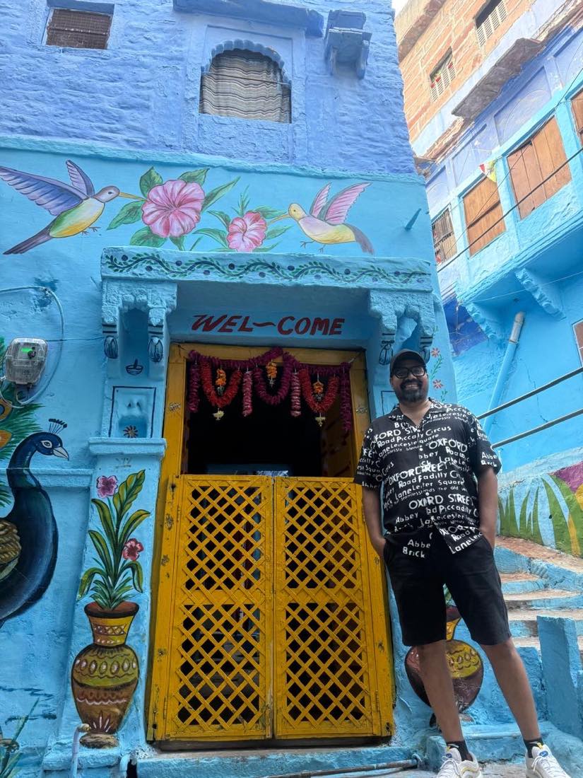 Hand-painted murals frame a doorway